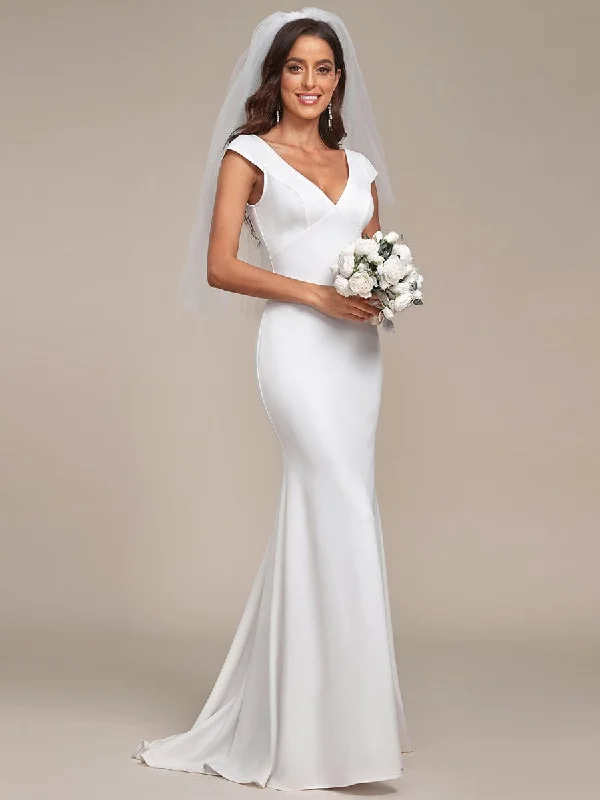 Rawiri cap sleeve fitted wedding gown in Ivory or Black